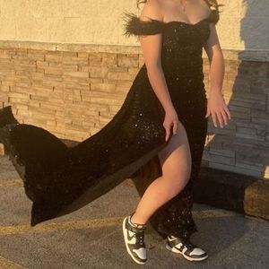 Long black sequins and feathers prom dress